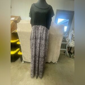 Elegant Black and Leopard Print Dress With Pockets. Like new no tags